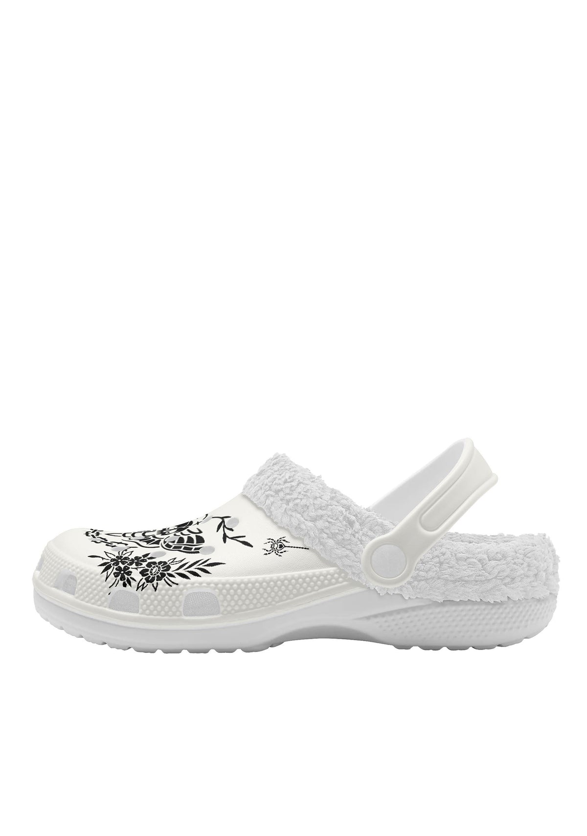 Side view of white fuzzy slippers with floral tattoo details