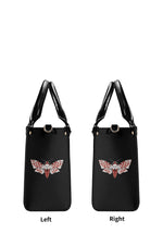 Left and right views of the gothic moth handbag with symmetrical venom moth prints