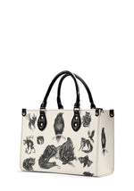Side view of gothic PU leather bag with fox and bat prints