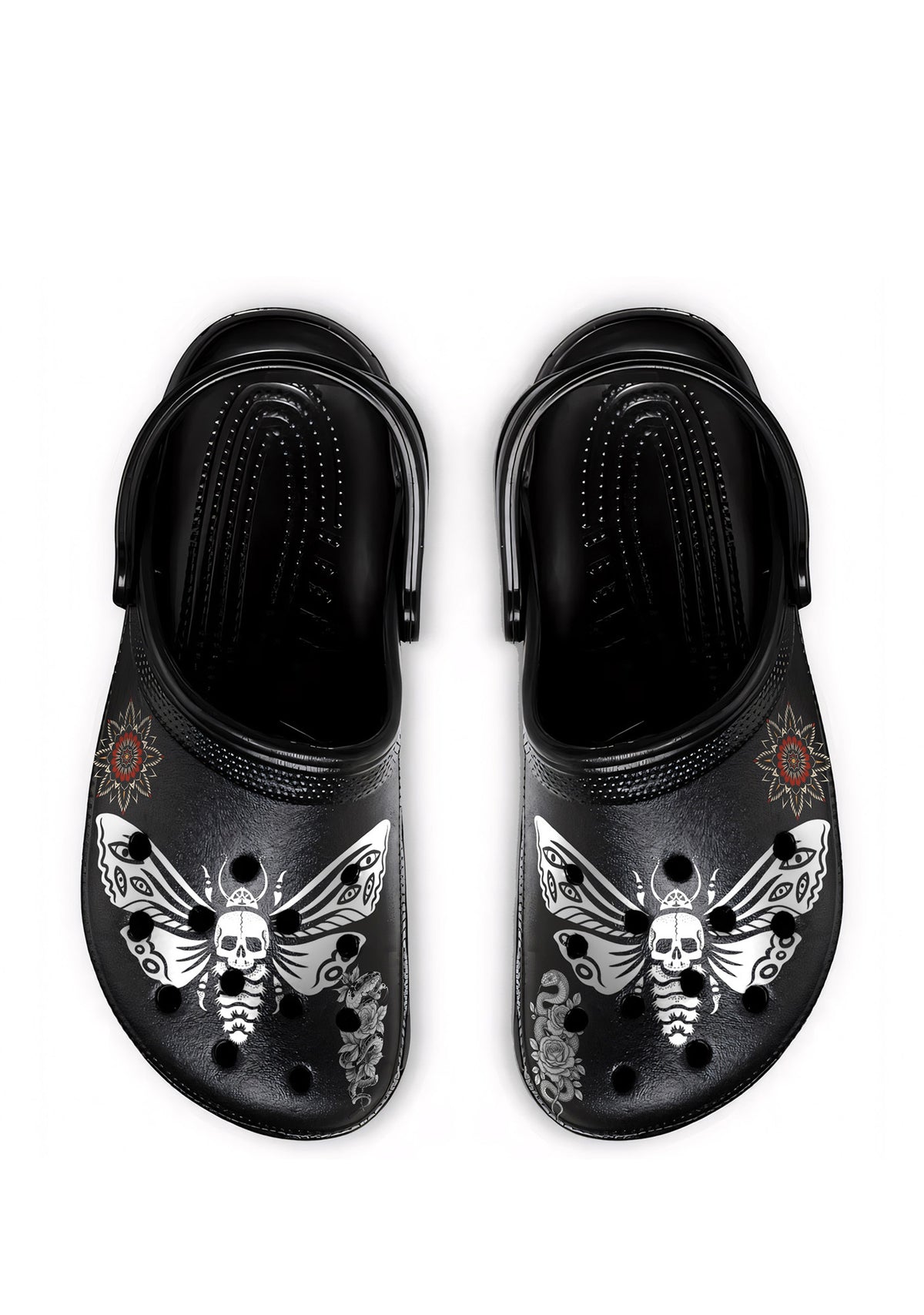 Top view of black slip-ons with white death moths, thorn roses, and mandala tattoo motifs