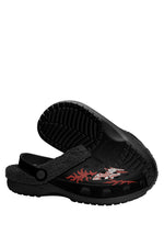 Sole view of comfy gothic clogs with black tread