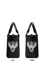 Gothic PU leather handbag showing side panels with cross and heart design