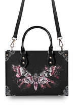 rear view of the Tattoo Moth Graffiti Handbag with adjustable strap attached