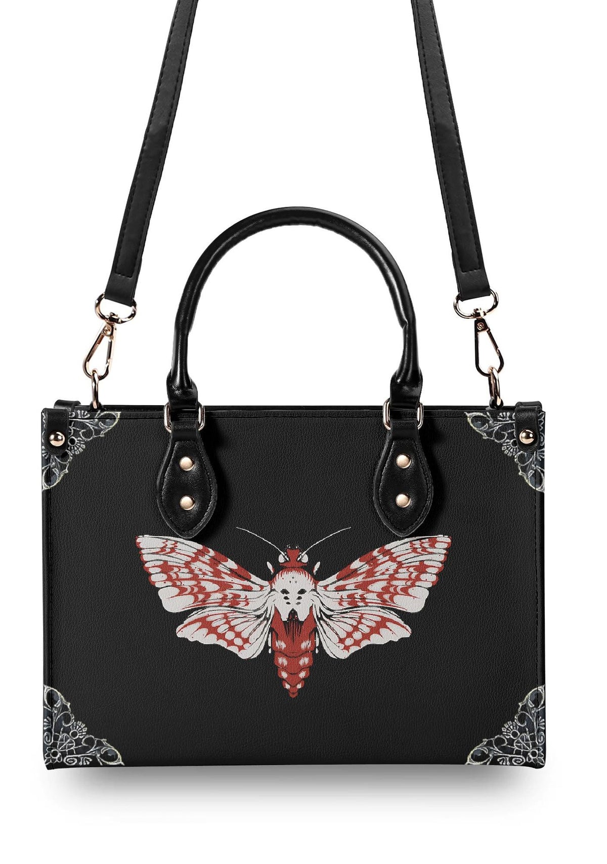 Top view of handbag with detachable black strap and venom moth centerpiece