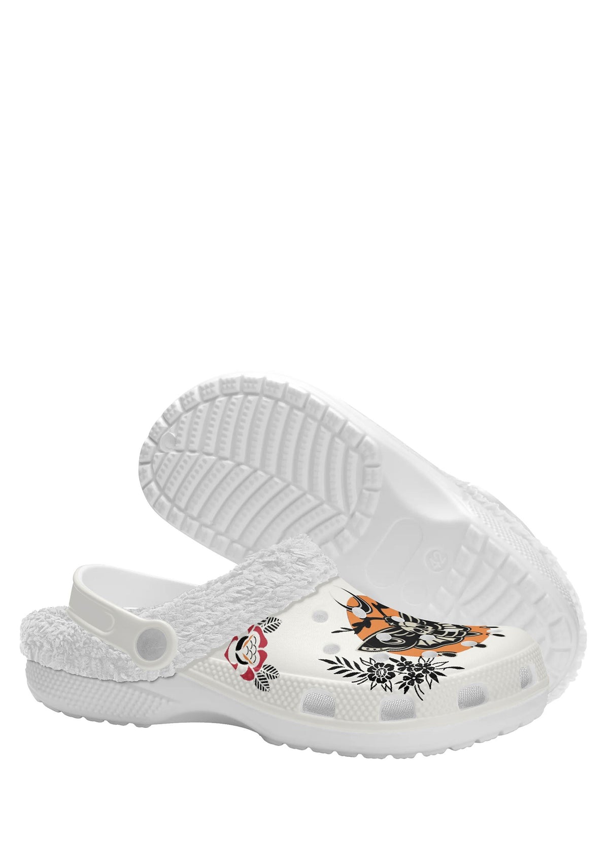 Underside of white fuzzy shoe showing floral and moth design