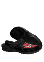 Sole view of chunky slippers with black tread design