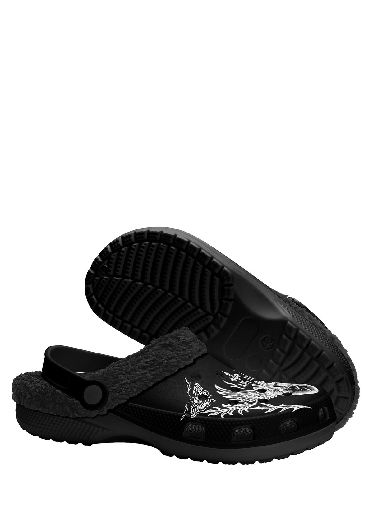 Bottom view of the slippers showing the black outsole with a textured non-slip grip pattern
